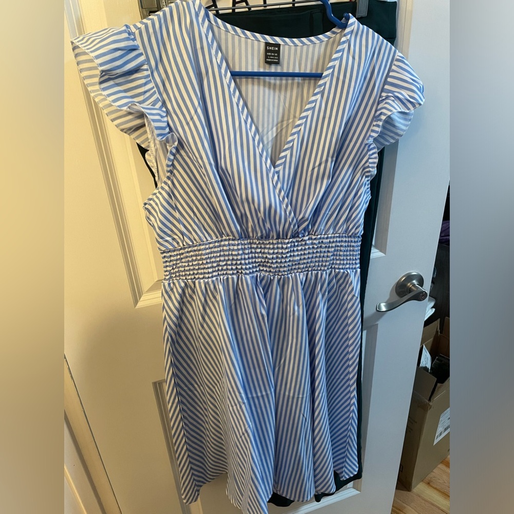 Light blue striped mini dress Size L never worn